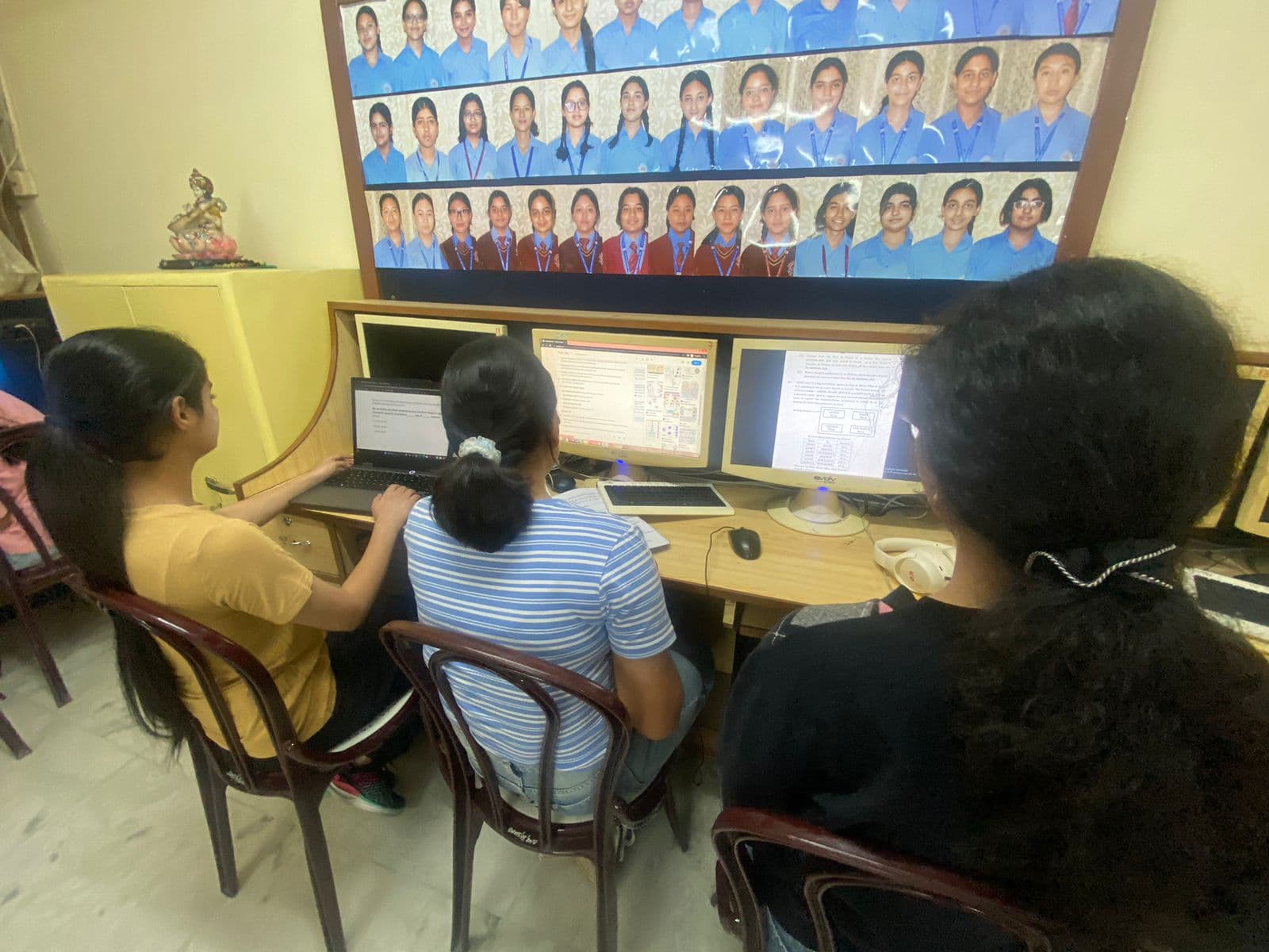 Girls working in the computer lab